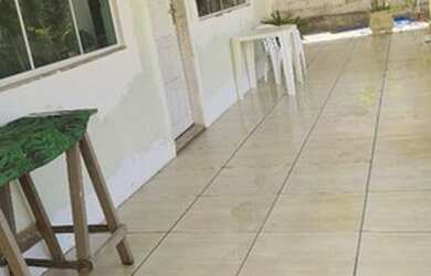 Imagem: A casa possui 1 Dormitório e 3 Vagas na garagem e está localizado