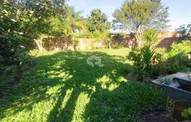 Imagem 12: Casa Ampla de 3 dormitórios sendo 1 suíte. Garagem coberta 2 carros. Pátio frente e fundos