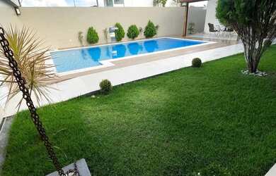 Imagem: A casa possui 3 Dormitórios, 3 Banheiros, 2 Vagas na garagem