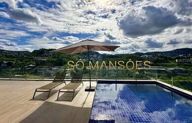 Imagem: A casa possui 4 Dormitórios, 5 Banheiros, 3 Vagas na garagem