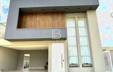 Imagem: A casa possui 4 Dormitórios, 5 Banheiros, 4 Vagas na garagem