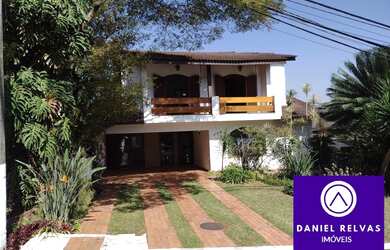 Imagem: A casa possui 3 Dormitórios, 4 Banheiros, 4 Vagas na garagem