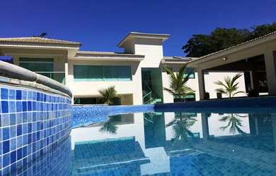 Imagem: A casa em condomínio possui 4 Dormitórios, 5 Banheiros, 5