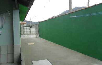 Imagem: A casa possui 2 Dormitórios, 2 Banheiros, 3 Vagas na garagem