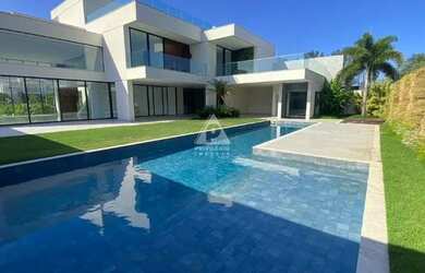 Imagem: A casa em condomínio possui 5 Dormitórios, 5 Banheiros, 5