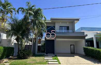 Imagem: A casa possui 4 Dormitórios, 5 Banheiros, 4 Vagas na garagem