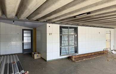 Imagem: A casa possui 3 Dormitórios, 2 Banheiros, 4 Vagas na garagem