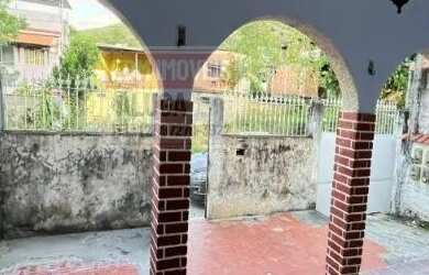 Imagem: A casa possui 3 Dormitórios, 2 Banheiros, 3 Vagas na garagem