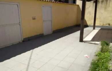 Imagem: A casa possui 3 Dormitórios, 3 Banheiros, 3 Vagas na garagem