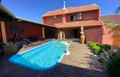 Imagem: Casa com 7 dormitórios à venda, 202 m² por R$ 999.900,00