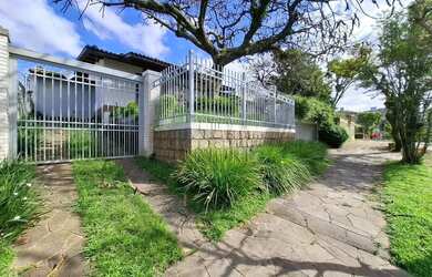 Imagem: A casa para alugar possui 3 Dormitórios, 4 Banheiros, 5 Vagas