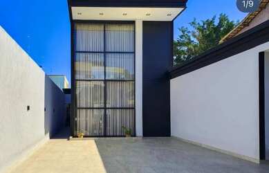 Imagem: A casa possui 3 Dormitórios, 4 Banheiros, 5 Vagas na garagem