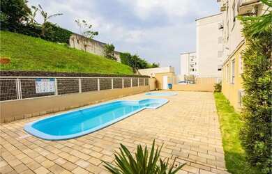 Imagem: O apartamento possui 2 Dormitórios, 1 Banheiro, 1 Vaga na garagem