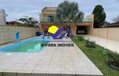 Imagem: A casa possui 4 Dormitórios, 3 Banheiros, 4 Vagas na garagem