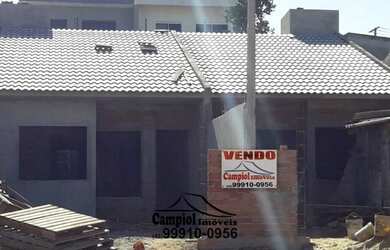 Imagem: A casa possui 2 Dormitórios, 1 Banheiro, 2 Vagas na garagem