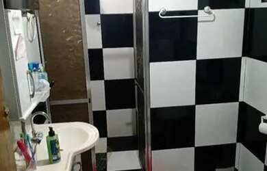 Imagem: A casa possui 2 Dormitórios, 1 Banheiro, 1 Vaga na garagem