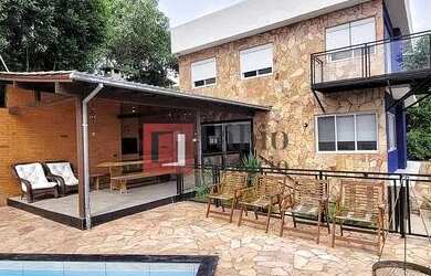 Imagem: A casa possui 2 Dormitórios, 3 Banheiros, 2 Vagas na garagem