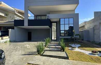 Imagem: A casa possui 3 Dormitórios, 4 Banheiros, 4 Vagas na garagem