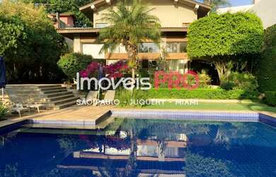 Imagem: A casa possui 4 Dormitórios, 5 Banheiros, 5 Vagas na garagem