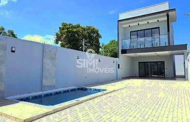 Imagem: A casa possui 3 Dormitórios, 3 Banheiros, 5 Vagas na garagem