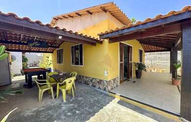 Imagem: A casa possui 2 Dormitórios, 2 Banheiros, 3 Vagas na garagem