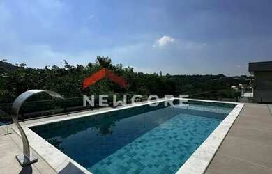 Imagem: A casa em condomínio possui 4 Dormitórios, 5 Banheiros, 4