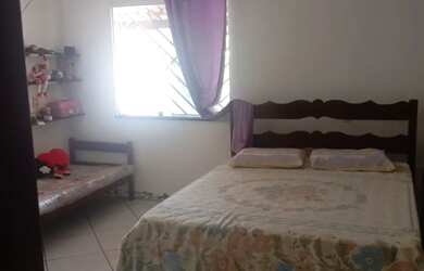 Imagem: A casa possui 2 Dormitórios, 2 Banheiros, 3 Vagas na garagem