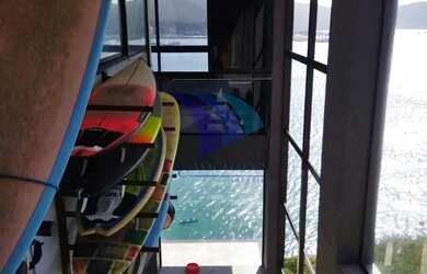 Imagem: A casa possui 2 Dormitórios, 4 Banheiros, 4 Vagas na garagem