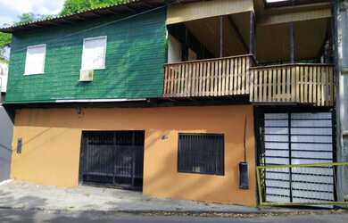 Imagem: A casa possui 2 Dormitórios, 2 Banheiros, 4 Vagas na garagem