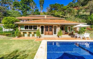 Imagem: A casa em condomínio à venda possui 5 Dormitórios, 3 Banheiros