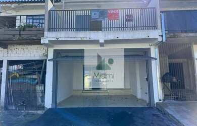 Imagem: A casa possui 2 Dormitórios, 2 Banheiros, 2 Vagas na garagem