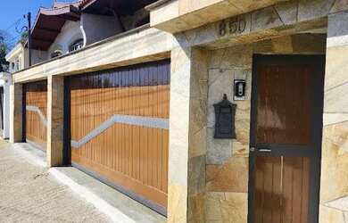 Imagem: A casa possui 5 Dormitórios, 5 Banheiros, 5 Vagas na garagem