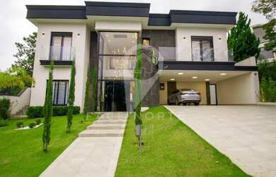 Imagem: A casa em condomínio possui 4 Dormitórios, 5 Banheiros, 5