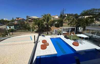 Imagem: A casa possui 5 Dormitórios, 5 Banheiros, 5 Vagas na garagem