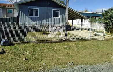 Imagem: A casa possui 3 Dormitórios, 1 Banheiro, 3 Vagas na garagem