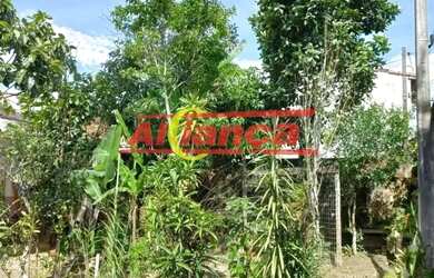 Imagem: A casa possui 3 Dormitórios, 2 Banheiros, 4 Vagas na garagem