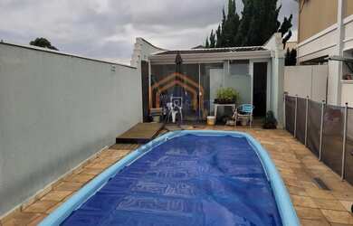 Imagem: A casa em condomínio possui 3 Dormitórios, 4 Banheiros, 5