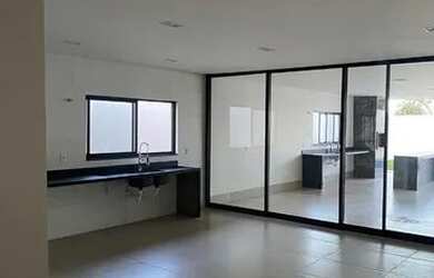 Imagem: A casa possui 4 Dormitórios, 5 Banheiros, 4 Vagas na garagem