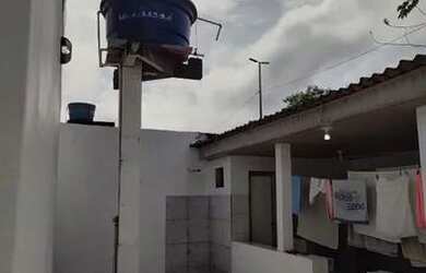 Imagem: A casa possui 2 Dormitórios, 3 Banheiros, 2 Vagas na garagem