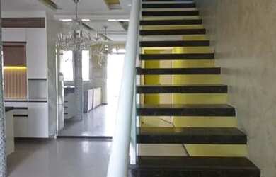 Imagem: A casa possui 3 Dormitórios, 2 Banheiros, 3 Vagas na garagem