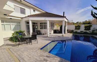 Imagem: A casa em condomínio possui 3 Dormitórios, 5 Banheiros, 5