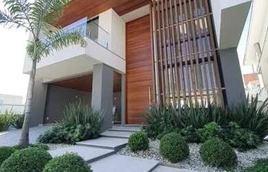 Imagem: A casa possui 3 Dormitórios, 3 Banheiros, 2 Vagas na garagem