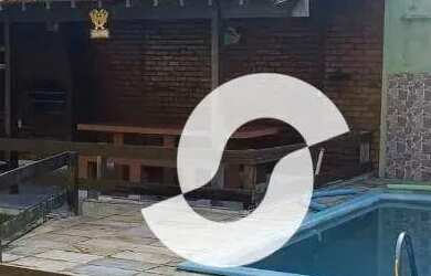 Imagem: A casa possui 4 Dormitórios, 1 Banheiro, 4 Vagas na garagem