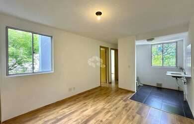 Imagem: O apartamento possui 2 Dormitórios, 1 Banheiro, 1 Vaga na garagem