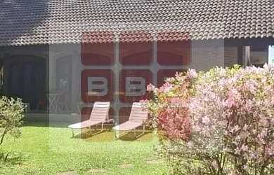 Imagem: A casa possui 5 Dormitórios, 5 Banheiros, 5 Vagas na garagem