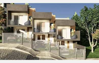 Imagem: A casa possui 2 Dormitórios, 2 Banheiros, 2 Vagas na garagem