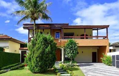 Imagem: A casa em condomínio possui 5 Dormitórios, 5 Banheiros, 4