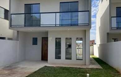 Imagem: A casa possui 3 Dormitórios, 3 Banheiros, 2 Vagas na garagem