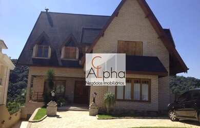 Imagem: A casa em condomínio possui 5 Dormitórios, 5 Banheiros, 5