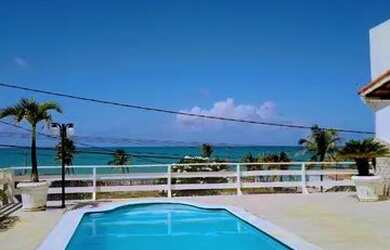 Imagem: A casa possui 4 Dormitórios, 4 Banheiros, 4 Vagas na garagem